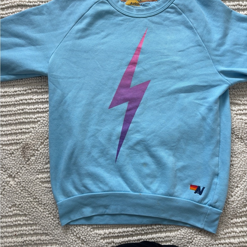 Aviator Nation Light Blue Kids Sweatshirt with Purple Lightning Bolt